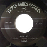 Trouble (33) : Snake Eyes (7", Single, Ltd)